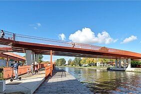 Fußgänger- und Radwegbrücke Passerelle Lucie-Bréard in Saint-Denis, Frankreich: eine markante, rot-orange gestrichene Stahlbrücke über einen Kanal, mit Promenade auf Wasserniveau und erhöhtem Brückendeck, belebt von Passanten und einem E-Roller-Fahrer, vor blauem Herbsthimmel.