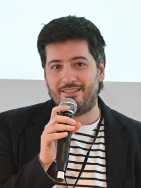 Rodoljub Jovanović speaking into an microphone